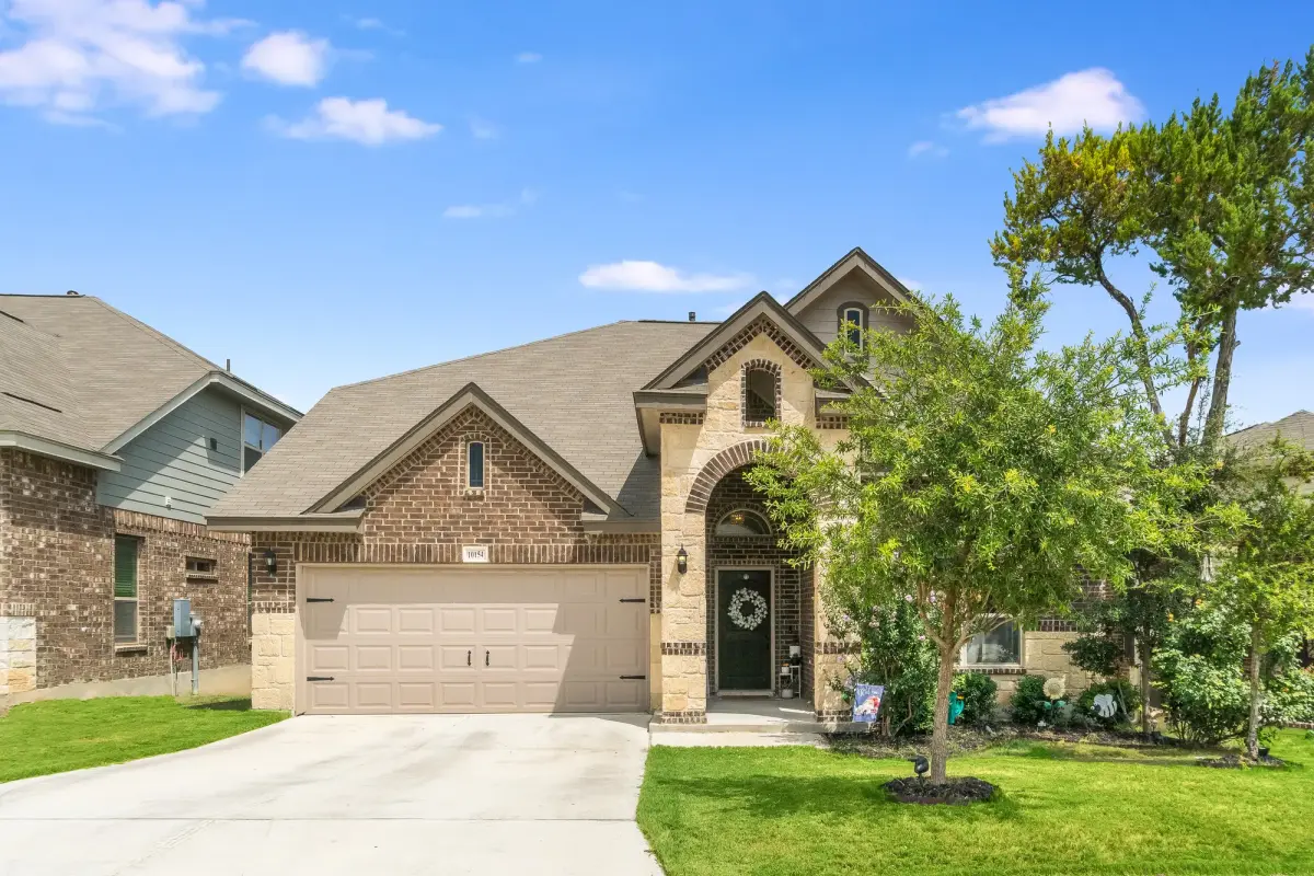 Completed residential roof on a North Texas-style home