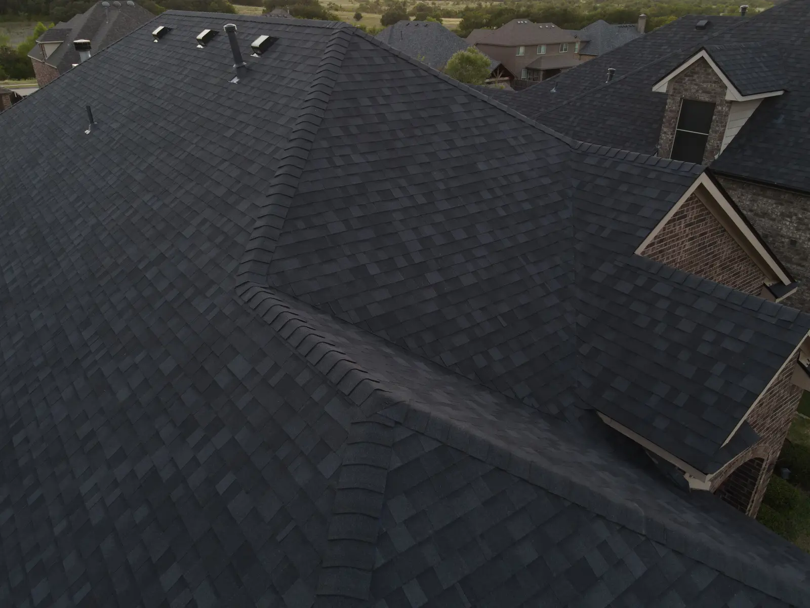 Finished shingle and hip-and-ridge details at the Fort Worth project